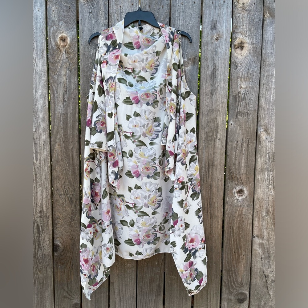 Floral, sleeveless wrap or swimsuit cover.